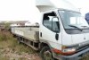 Zacisk hamulcowy przód lewy Mitsubishi Canter VI 2000 2.8TD 4M40-2AT 